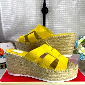 (O) Marc Fisher
Women's suede wedge sandals with a yellow platform, size 9